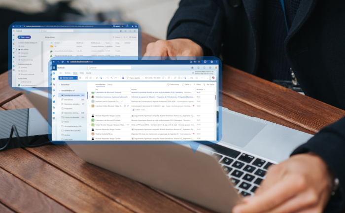 Fotografía de una persona con su computador y unas burbujas sobresaliendo con un correo abierto
